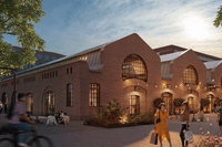 En vy av en tegelbyggnad i industriell stil med stora halvmåneformade fönster på andra våningen. Utanför rör sig människor.